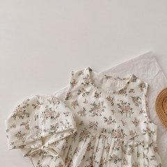 Baby Girl Sleeveless Floral Print Romper Combo Hat In Summer Outfit Wearing Wholesale